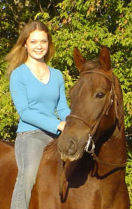 Rachel riding her horse